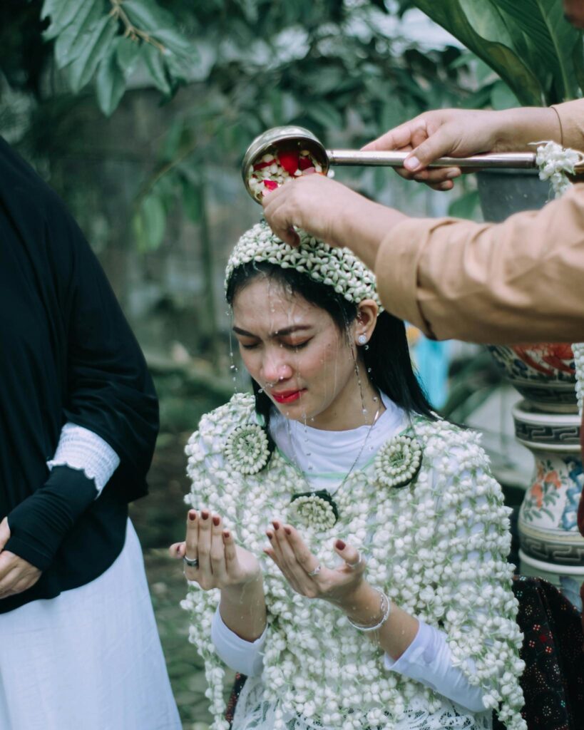 A cultural siraman ritual for a bride in Jawa Barat, Indonesia.