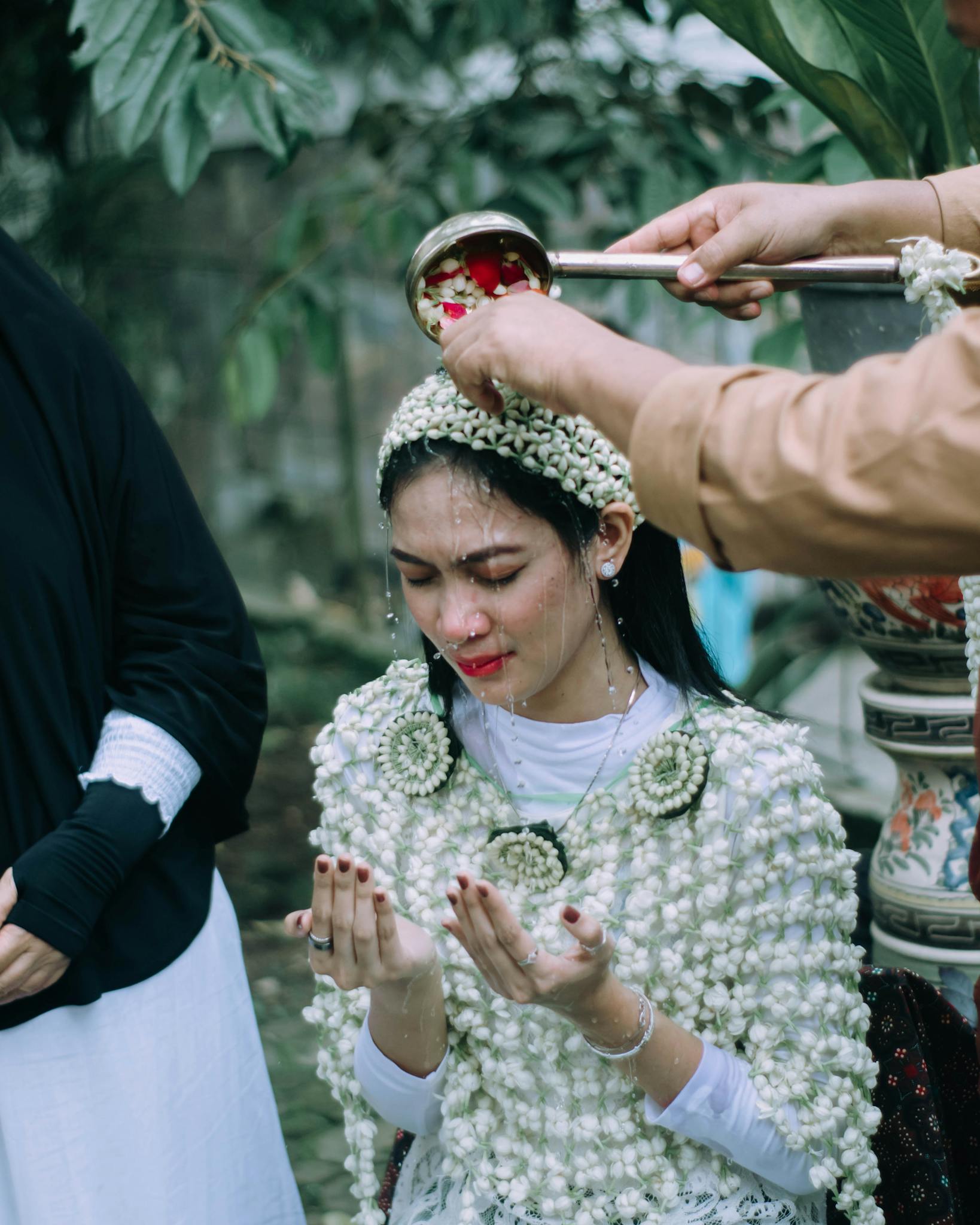 A cultural siraman ritual for a bride in Jawa Barat, Indonesia.